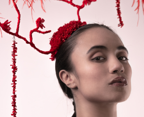 Red tree headpiece with red lace flowers and red feathers by Haruco-vert - Fashion photo by Ruud van Ooij