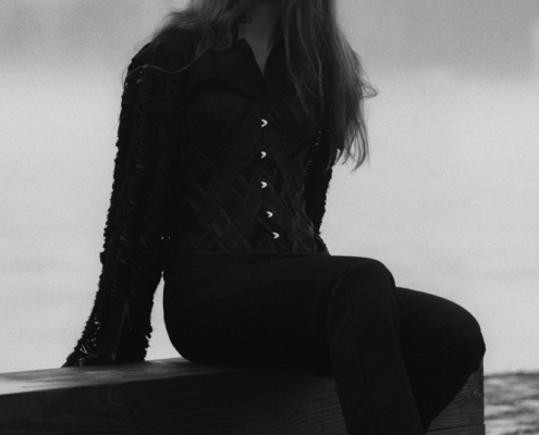 Black trousers and black shirt with black corset belt by Haruco-vert - Fashion editorial Amsterdam Ruud van Ooij