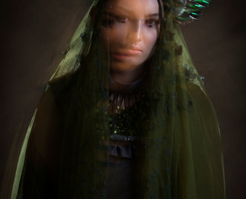 Green veil with beetle wing halo portrait - Fashion editorial Ruud van Ooij
